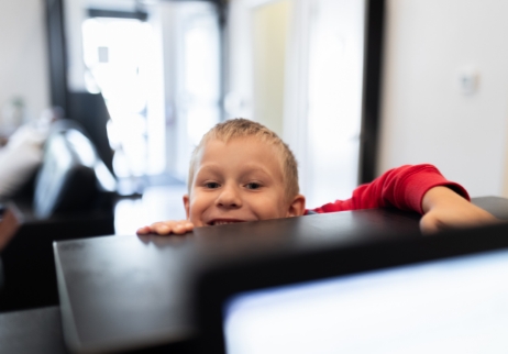 Doctor Owens laughing with dental patient